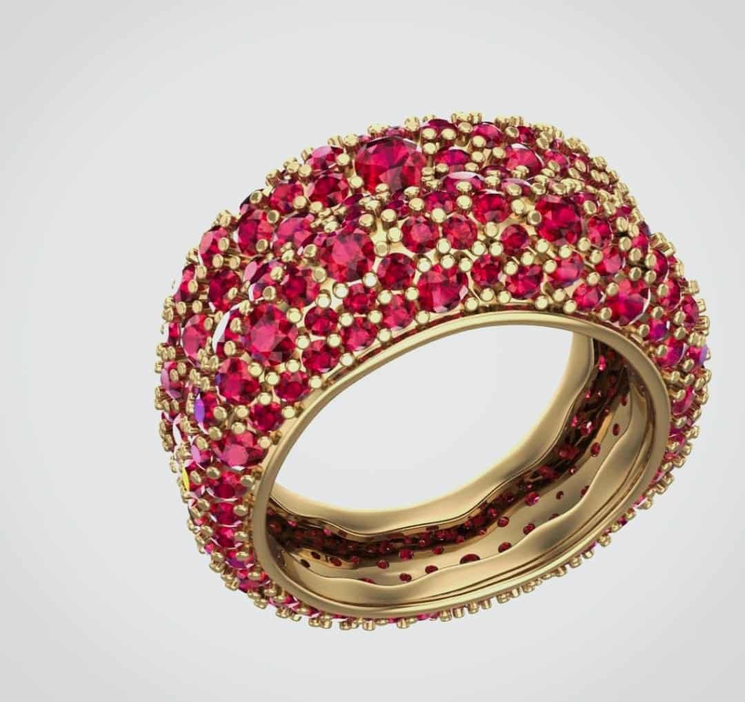 Étude 3D d’une bague bombée ornée de pierres rouges, vue de trois quarts